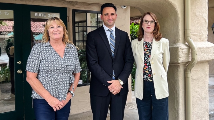Attorney Paul Jonna (center) is seeking civil contempt sanctions on behalf of clients Lori Ann West (L) and Elizabeth Mirabelli (R), who claim they are effectively being kept from returning to work in violation of a court order.