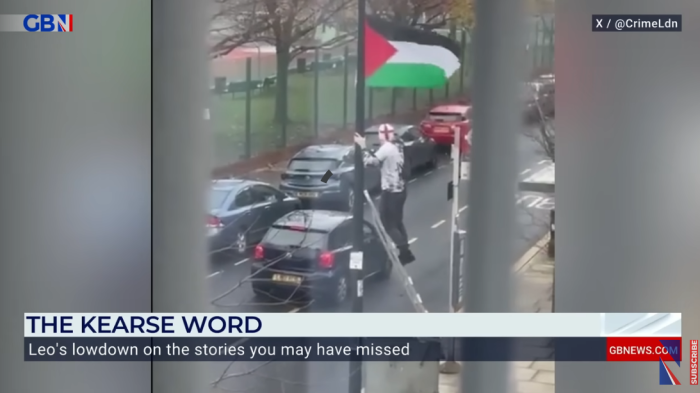 A screenshot of a British man taking down a Palestinian flag in a London borough. 