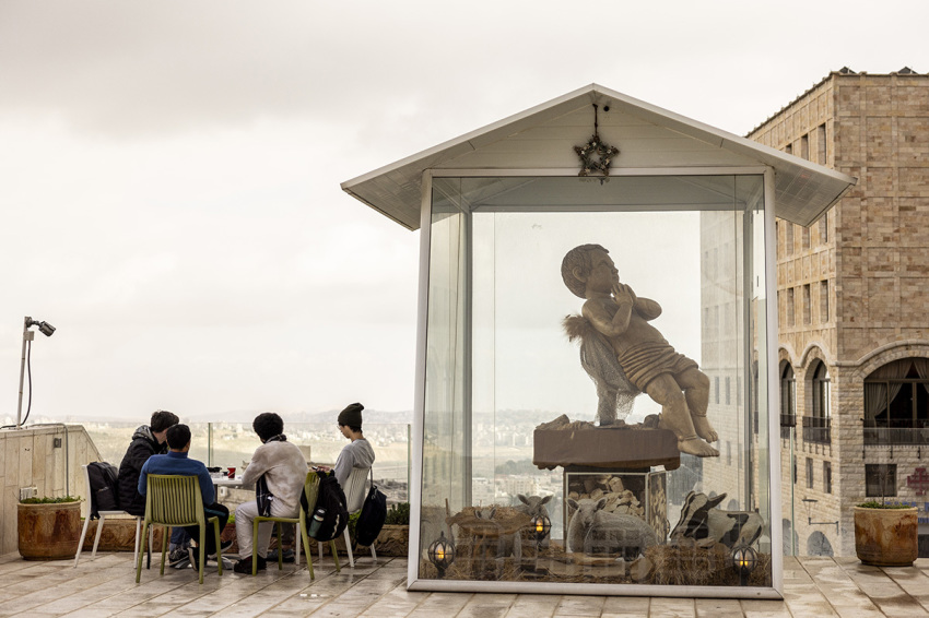  A baby Jesus is seen in coffee shop on December 25, 2023, in Bethlehem, West Bank. Last month, Christian Palestinian leaders here called off public Christmas celebrations, citing the effects of the ongoing war in Gaza. Regarded by Christians as the birthplace of Jesus, Bethlehem is usually bustling with tourists this time of year, with streets full of holiday decoration and vendors selling ornaments and festive figurines. Israel's war against Hamas that was sparked by the Oct. 7 terrorist attacks has also made life more volatile in the West Bank. Israeli forces here have stepped up raids on alleged militants, police have clashed with protesters, and there has been a rise in violence between Palestinians by Israelis. 