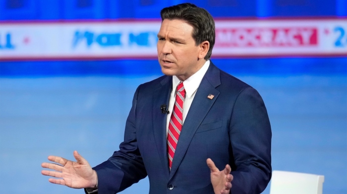 Florida Gov. Ron DeSantis speaks to Iowa primary voters during a Fox News town hall event in Des Moines on Jan. 9, 2024.