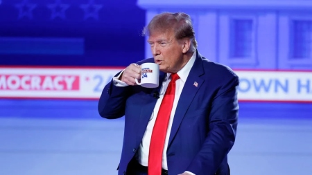 Former President Donald Trump attends a Fox News town hall on January 10, 2023, in Des Moines, Iowa. 