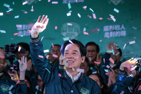 Confetti flies over the stage and crowd as Taiwan's Vice President and presidential-elect from the Democratic Progressive Party (DPP) Lai Ching-te speaks to supporters at a rally at the party's headquarters on January 13, 2024, in Taipei, Taiwan. Taiwan voted in a general election on Jan. 13 that will have direct implications for cross-strait relations.