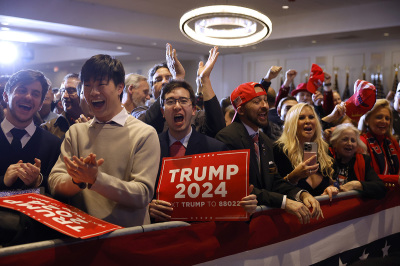 Supporters of Republican presidential candidate and former U.S. President Donald Trump cheer at his primary night party at the Sheraton on January 23, 2024, in Nashua, New Hampshire. New Hampshire voters cast their ballots in their state's primary election today. With Florida Governor Ron DeSantis dropping out of the race Sunday, former President Donald Trump and former U.N. Ambassador Nikki Haley are battling it out in this first-in-the-nation primary. 