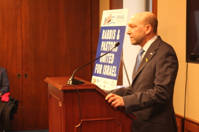 Eliav Benjamin speaks to a gathering of Christians and Jews at the Rayburn House Office Building in Washington, DC, on Jan. 31, 2024.