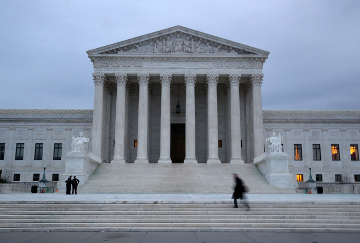 A man walks up the steps of the U.S. Supreme Court on January 31, 2017, in Washington, D.C.