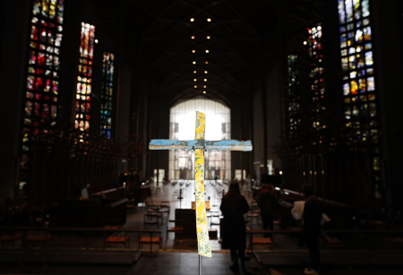 The Lampedusa Cross stands on the Alter at Coventry Cathedral on May 21, 2021, in Coventry, England. "The Lampedusa Cross" is made from the remnants of a refugee boat wrecked near the Italian island of Lampedusa where 311 lives were lost.
