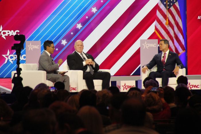 Reporter Julio Rosas (left) moderates a panel at Conservative Political Action Conference 2024 featuring Fmr. Director of the U.S. Immigration and Customs Enforcement Tom Homan (middle) on Feb. 22, 2024.
