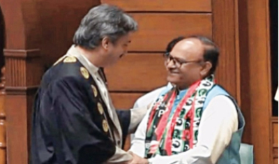 Newly-elected Sindh Assembly Speaker Syed Owais Qadir Shah is seen greeting Deputy Speaker Anthony Naveed after the latter took oath of office on February 24, 2024. 