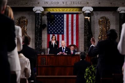 President Joe Biden delivers the annual State of the Union address before a joint session of Congress in the House chamber at the U.S. Capital building on March 7, 2024, in Washington, D.C. Seated to the right of Biden is Speaker of the House Mike Johnson. Vice President Kamala Harris stands to the left of Biden. 