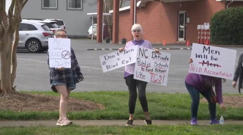 Residents of Union County, North Carolina, protest outside Bible Baptist Tabernacle in Monroe on March 3, 2024, in opposition to Pastor Bobby Leonard's sermon comments on rape.