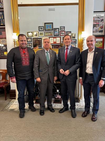 (L) Pavlo Unguryan, executive secretary for the Ukrainian Evangelical Conservative Movement, stands with Sens. Graham and Blumenthal and Karl Ahlgren (R).