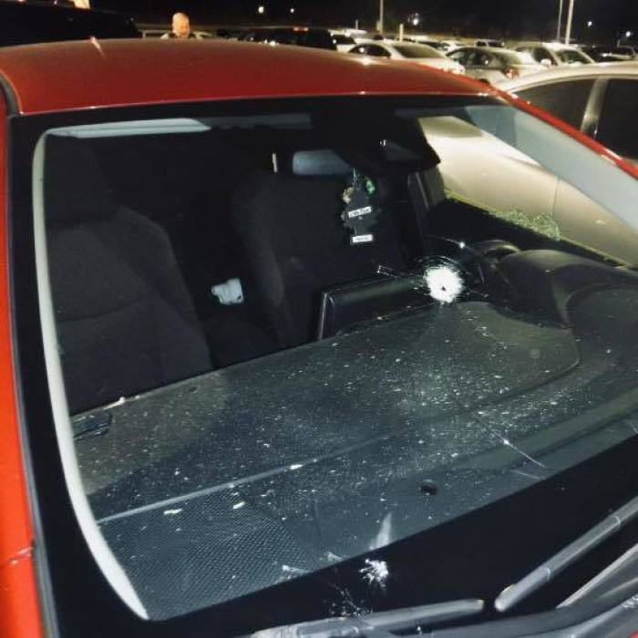 The bullet-damaged windshield of Pastor Samuel Pasillas' alleged victim.