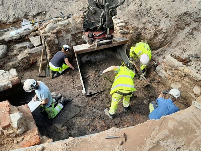 Workers dig at an archeological site in Kalmar, Sweden.