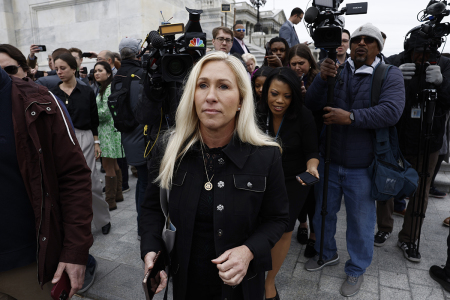 Rep. Marjorie Taylor Greene, R-Ga., is followed by reporters after speaking outside of the U.S. Capitol on March 22, 2024, in Washington, D.C. 