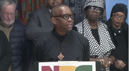 The Rev. Kevin Peterson of the Boston People's Reparations Commission speaks during a press conference in Boston, Massachusetts, on March 23, 2024.