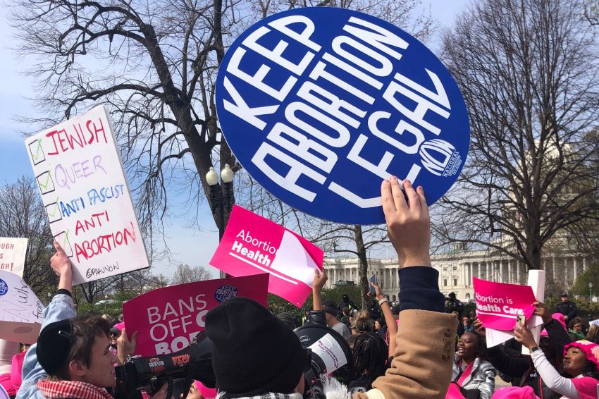 Pro-life and pro-choice people clash outside of the U.S. Supreme Court on March, 26, 2024, during oral arguments for FDA v. Alliance for Hippocratic Medicine.