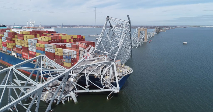The wreckage of the Francis Scott Key Bridge and Cargo Ship Dali are seen in this drone photo on March 26, 2024. 