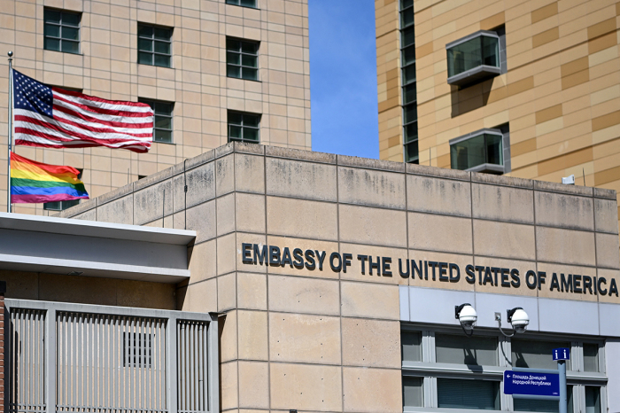 U.S. national (top) and rainbow flags are pictured at the U.S. embassy in Moscow on June 30, 2022. 