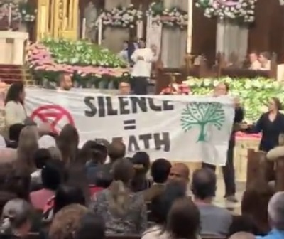 Activists disrupt Holy Saturday service at St. Patrick's Cathedral in New York City on March 30, 2024. 