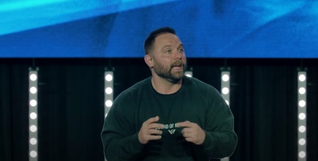 Pastor Jordan Green of Pursuit Church in Denver, North Carolina, preaching a sermon in March 2024. 