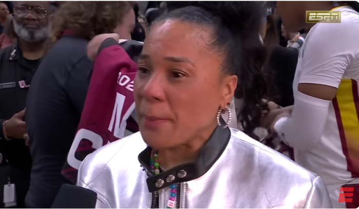 South Carolina Gamecocks women's basketball coach Dawn Staley speaks with ESPN following her team's NCAA National Championship victory over the University of Iowa on April 7, 2024. 