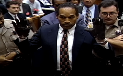 O.J. Simpson in raises his hand during his trial for the June 1994 murders of his ex-wife, Nicole Brown Simpson, and her friend Ronald Goldman. He was acquitted.