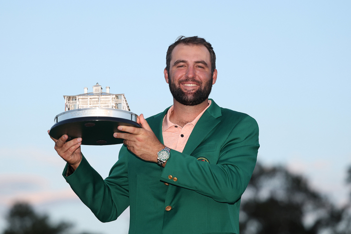 Scottie Scheffler of the United States poses with the Masters trophy after winning the 2024 Masters Tournament at Augusta National Golf Club on April 14, 2024, in Augusta, Georgia. 