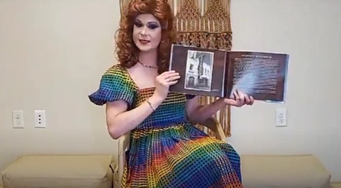 A drag queen known as Miss Amie reads during a story hour video uploaded to YouTube in June 2020.