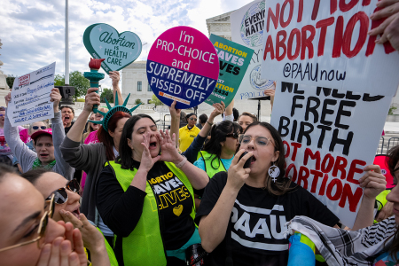 Abortion rights and pro-life supporters clash outside the Supreme Court on April 24, 2024, in Washington, D.C.