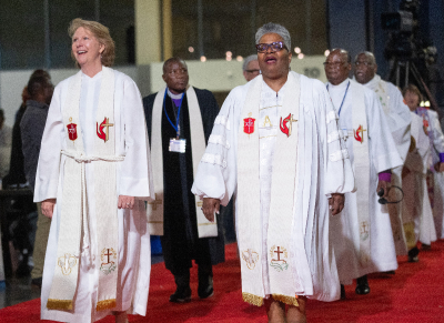 A procession of United Methodist bishops leads the opening worship at the 2024 United Methodist General Conference in Charlotte, North Carolina.