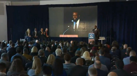 Pastor Charlie Dates of Salem Baptist Church of Chicago prays at the start of a press conference for the Chicago Bears' announcement of plans for a new multi-billion dollar stadium on the Chicago lakefront on April 24, 2024. 