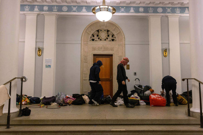 Demonstrators from the pro-Palestine encampment on Columbia's Campus barricade themselves inside Hamilton Hall, an academic building which has been occupied in past student movements, on Tuesday, April 30, 2024 in New York City. Pro-Palestinian demonstrators marched around the 