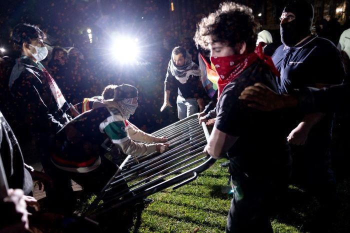 Counter protesters clash with pro-Palestinian demonstrators on the campus of the University of California Los Angeles (UCLA) on May 1, 2024. 