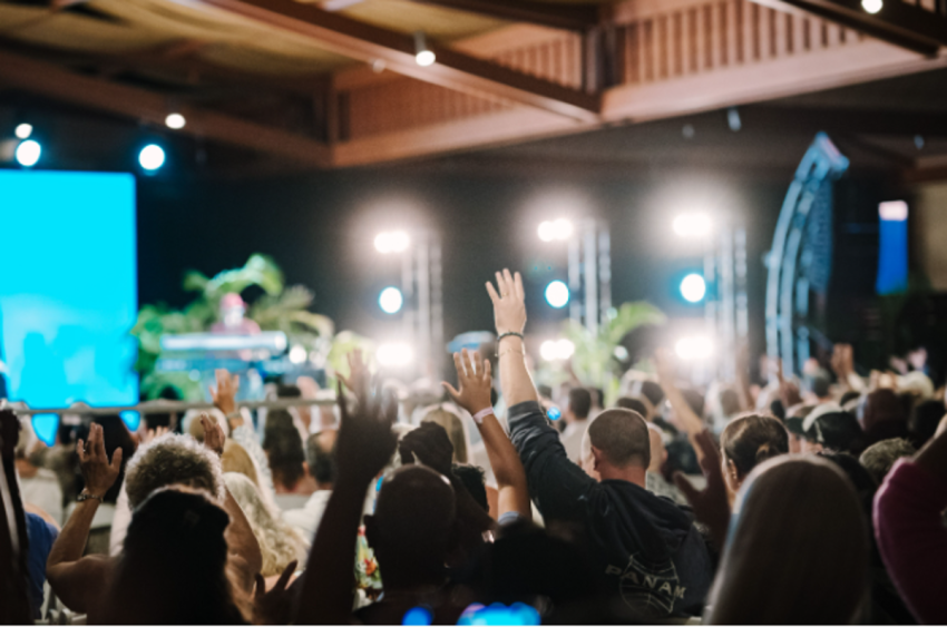 Worshipers participate in a "Hope for Lahaina" event at the Ritz Carlton in Maui, Hawaii, where Harvest Christian Fellowship Pastor Greg Laurie led two worship services that drew about 3,000 people.