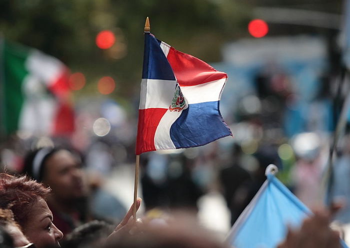 The flag of the Dominican Republic blows in the wind at a Hispanic Day parade in New York City in 2007. 