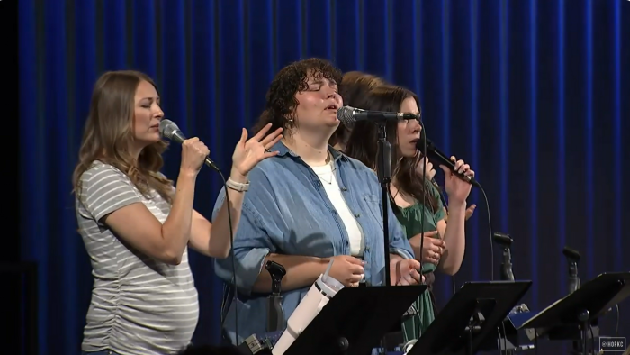 The worship team at International House of Prayer Kansas City's Forerunner Church performs on May 19, 2024, during the church's final service.