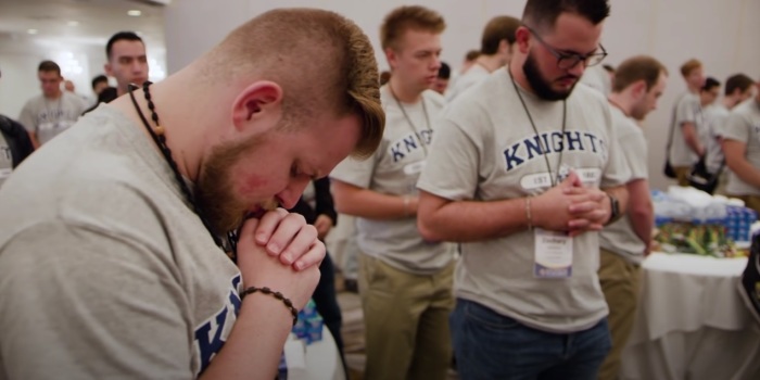 A Knights of Columbus chapter praying before an event in a video uploaded to YouTube in 2021. 
