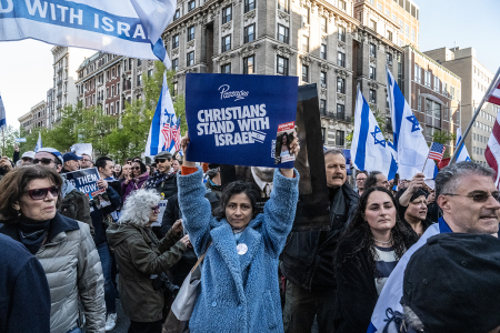 Israel supporters, including Christian Evangelicals, participate in the United for Israel march outside of Columbia University on April 25, 2024, in New York City. Israel supporters are reacting to the growing number of college campuses throughout the country whose student protesters are setting up pro-Palestinian tent encampments on school grounds.