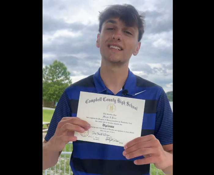 Micah Price after receiving his high school diploma on Wednesday, May 29, 2024.
