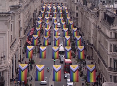 Progress Pride flags are displayed on Regent Street in London in 2023.