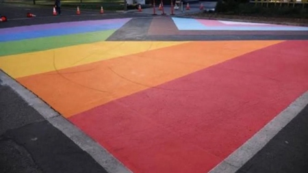 Three teenagers were arrested and charged for leaving skid marks on a pride mural in Spokane, Washington, with their scooters last year. Transportation Secretary Sean Duffy is urging state governors to remove distracting murals from roads altogether.