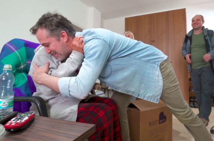 CEO of Jews for Jesus Aaron Abramson hugs a woman in Israel after giving her a care package.