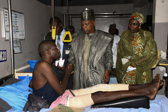 Nigeria Vice President Kashim Shettima (C) visits survivors of multiple suicide bombings as they recover in a hospital in Maiguguri on July 1, 2024. The death toll from the attacks in the northeastern Nigerian town of Gwoza over the weekend has risen to 32, the country's vice president Kashim Shettima said on Monday. Saturday's attack involving female suicide bombers targeting a wedding and a funeral was one of the worst bombings in northeast Nigeria in years, a reminder of the darker days of the country's long-running jihadist war. 