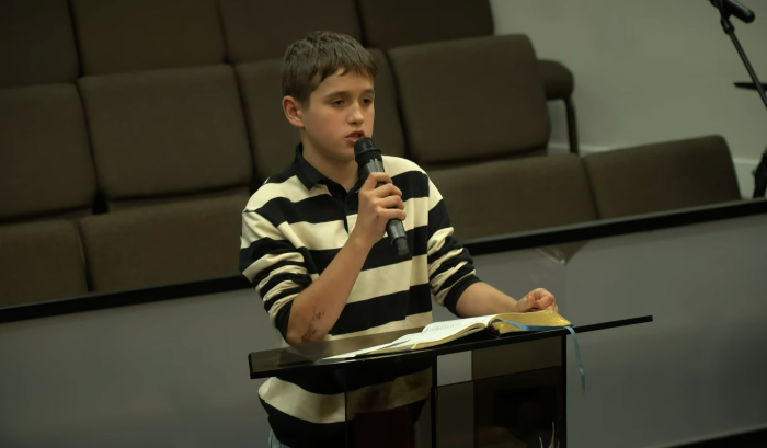 The late Matthiew Stavkovy, 13, reads Scripture at Bread of Life Church in Kent, Washington. 