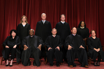 United States Supreme Court (front row L-R) Associate Justice Sonia Sotomayor, Associate Justice Clarence Thomas, Chief Justice of the United States John Roberts, Associate Justice Samuel Alito, and Associate Justice Elena Kagan, (back row L-R) Associate Justice Amy Coney Barrett, Associate Justice Neil Gorsuch, Associate Justice Brett Kavanaugh and Associate Justice Ketanji Brown Jackson pose for their official portrait at the East Conference Room of the Supreme Court building on October 7, 2022, in Washington, D.C. The Supreme Court has begun a new term after Associate Justice Ketanji Brown Jackson was officially added to the bench in September. 