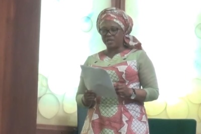 Joan Onyemaechi, an evangelist and former lawmaker, reads a bill in the Nigerian House of Representatives on Nov. 5, 2015. 