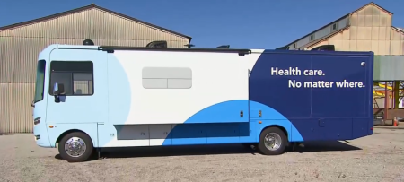 A Planned Parenthood mobile clinic bus is parked in Illinois