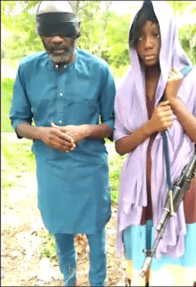 Pastor Isa Andrew and daughter Grace Isa Andrew, 13, in video appeal for ransom. 