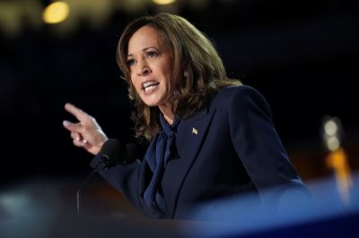 Democratic presidential nominee U.S. Vice President Kamala Harris speaks on stage. 