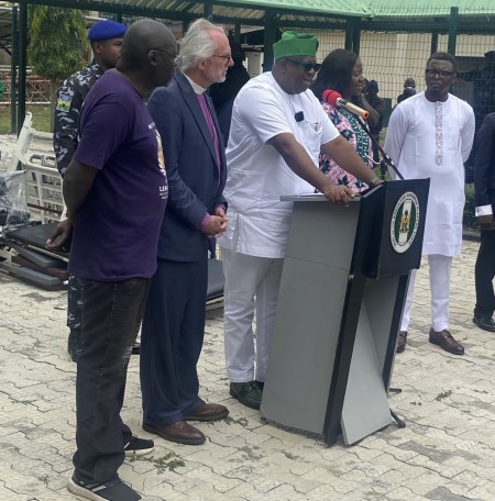 Plateau Gov. Caleb Mutfwang speaks at a press conference on Aug. 8 at the Plateau State Hospital. To his right are Pastor Bill Devlin (middle) and Emannuel Ogebe (left).